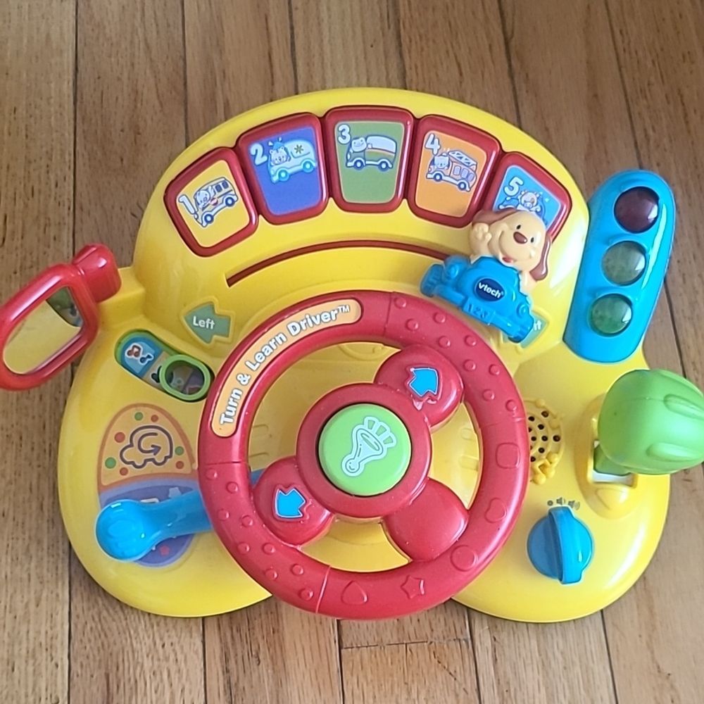 Yellow and Red Interactive Learning Toy with Steering Wheel and Colorful Buttons